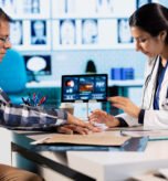 Man-patient-with-doctor-partaking-in-a-clinical-trial