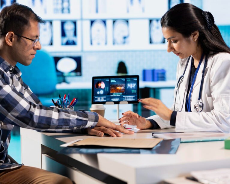 Man-patient-with-doctor-partaking-in-a-clinical-trial